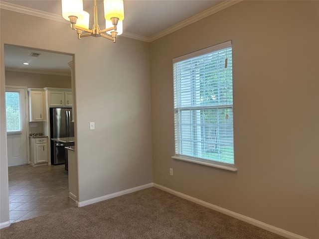 unfurnished room featuring carpet flooring, ornamental molding, a chandelier, and plenty of natural light