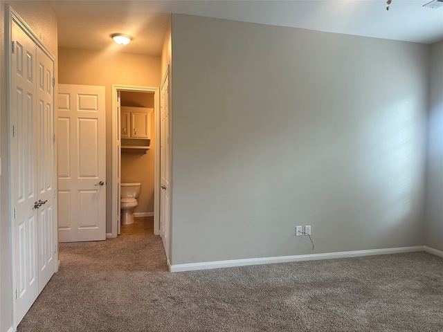 spare room featuring carpet floors