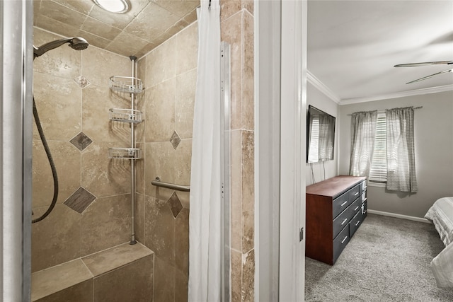 bathroom featuring a tile shower, ceiling fan, and crown molding