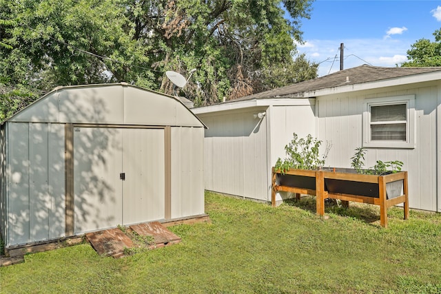 view of outdoor structure with a lawn