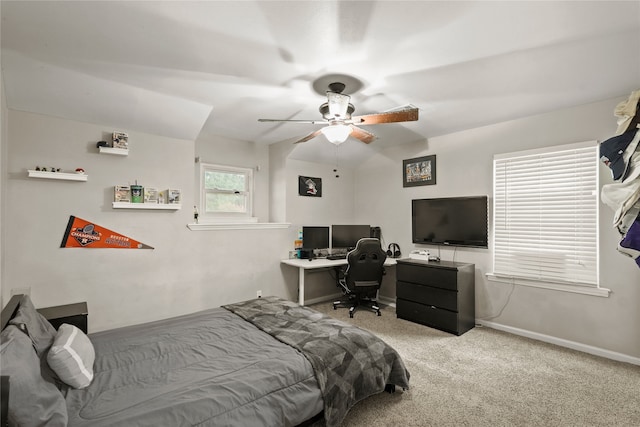 bedroom featuring ceiling fan and light colored carpet