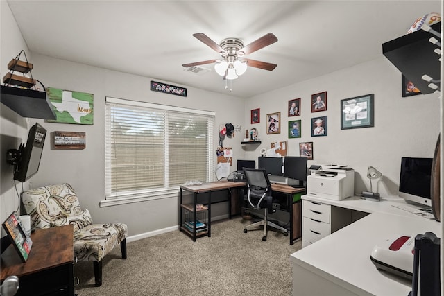 office space with light colored carpet and ceiling fan