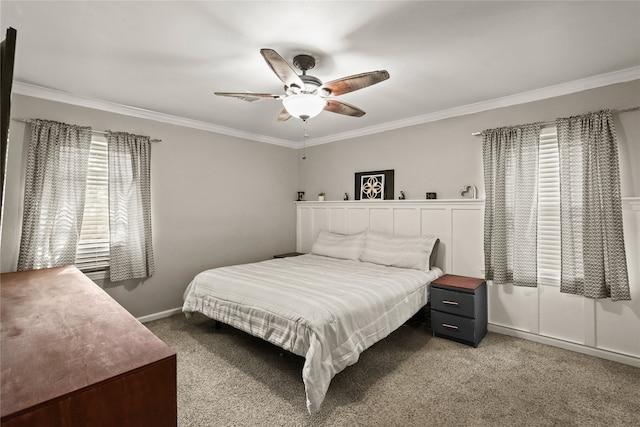 bedroom featuring carpet, multiple windows, and ceiling fan