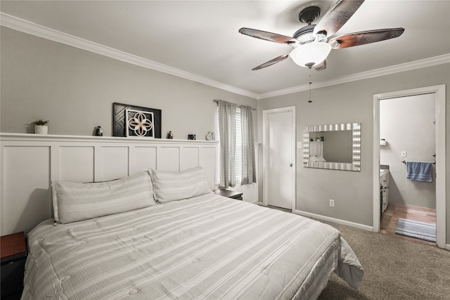 carpeted bedroom featuring ceiling fan and crown molding