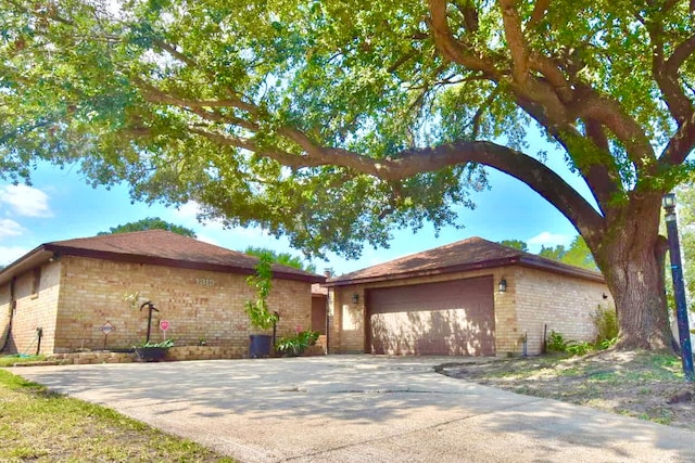 ranch-style home with a garage