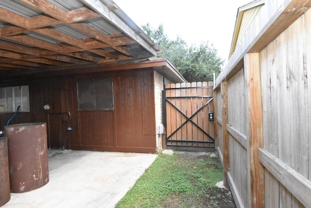 1315 Leadenhall Cir, Channelview, TX 77530 - view of side of property featuring a gate