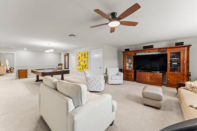 carpeted living room featuring ceiling fan and billiards