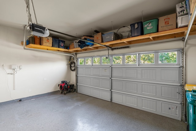 garage featuring a garage door opener