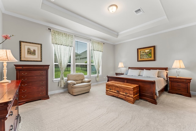 carpeted bedroom with a raised ceiling and crown molding