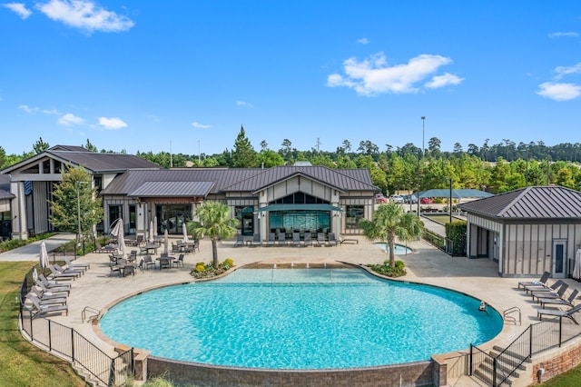 view of pool with a patio area