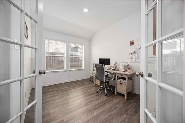 office space featuring lofted ceiling, french doors, and dark wood-type flooring