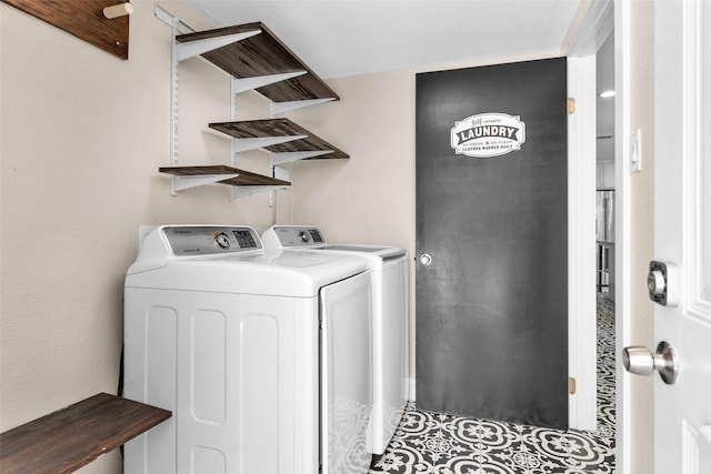 331 Cypresswood Dr, Spring, TX 77388 - washroom with independent washer and dryer and tile patterned floors