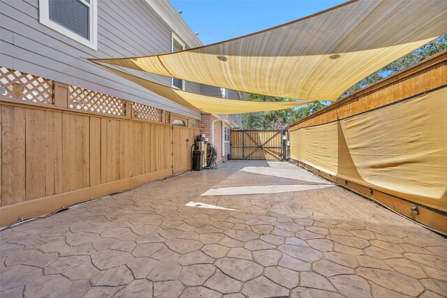 331 Cypresswood Dr, Spring, TX 77388 - view of patio with a gate and fence