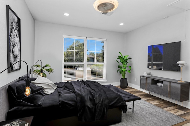 331 Cypresswood Dr, Spring, TX 77388 - bedroom with wood finished floors, recessed lighting, and attic access