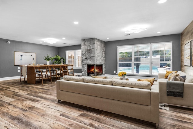 331 Cypresswood Dr, Spring, TX 77388 - living area featuring wood finished floors, a fireplace, recessed lighting, plenty of natural light, and baseboards