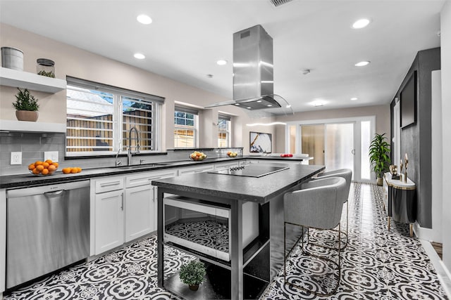 331 Cypresswood Dr, Spring, TX 77388 - kitchen with dishwasher, a sink, black electric cooktop, island range hood, and dark countertops