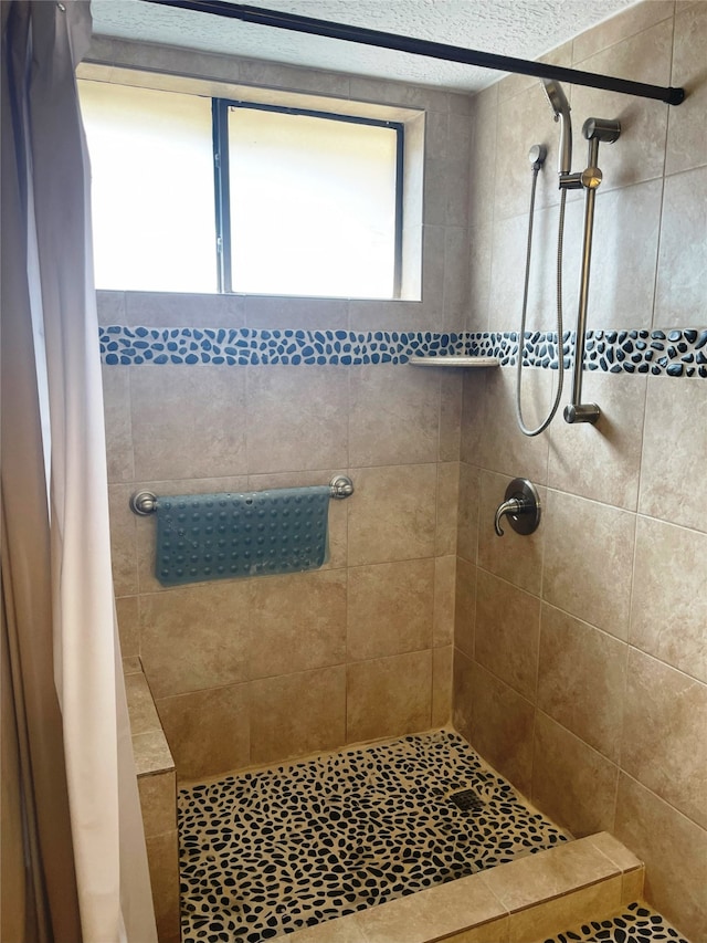 bathroom featuring walk in shower