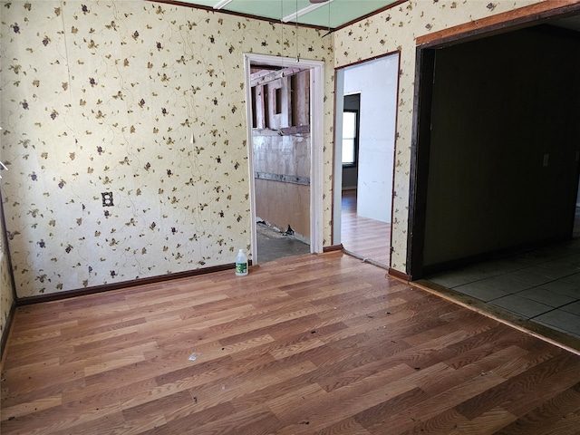 empty room featuring hardwood / wood-style flooring