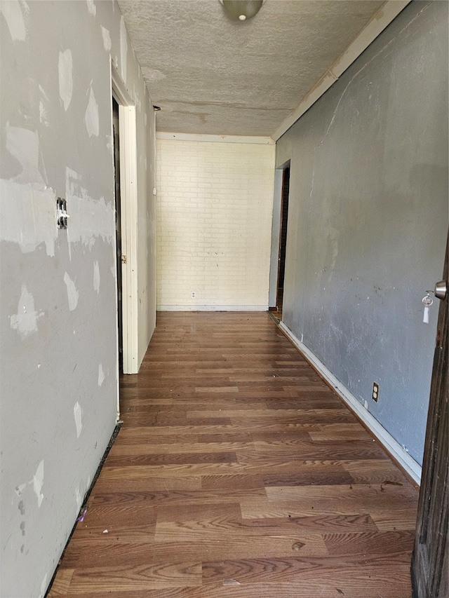 hallway with dark wood-type flooring