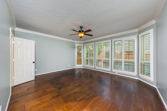 unfurnished room with ceiling fan, ornamental molding, a textured ceiling, and dark wood-type flooring