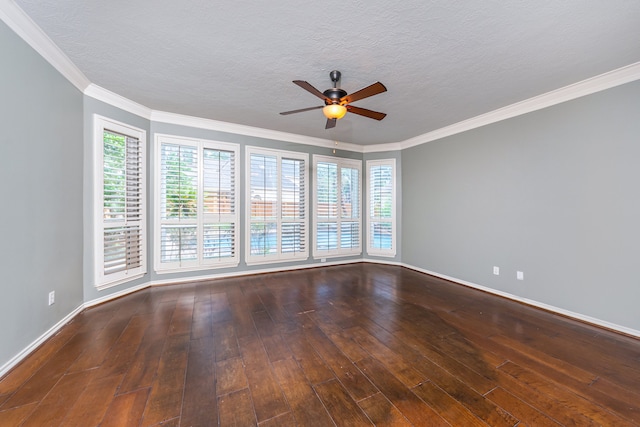 empty room with ceiling fan, plenty of natural light, and dark hardwood / wood-style flooring