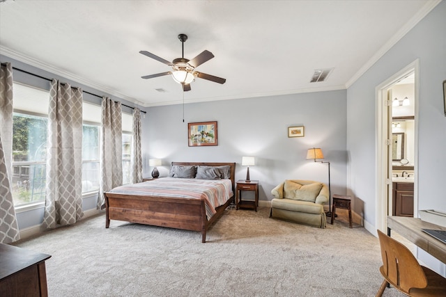 carpeted bedroom with sink, ceiling fan, ensuite bathroom, and crown molding