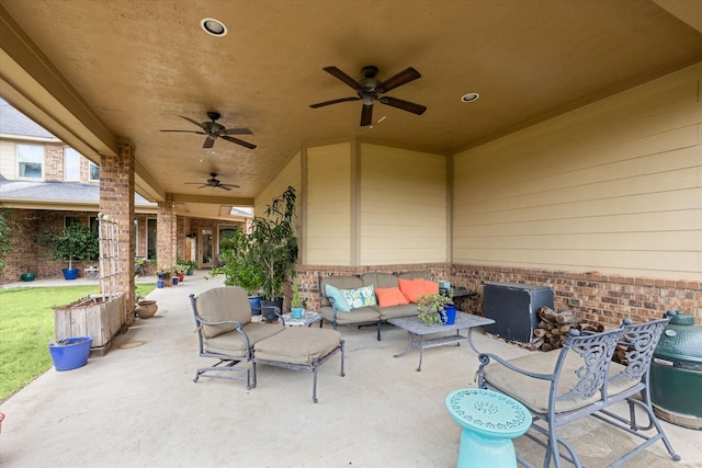 view of patio featuring outdoor lounge area and ceiling fan