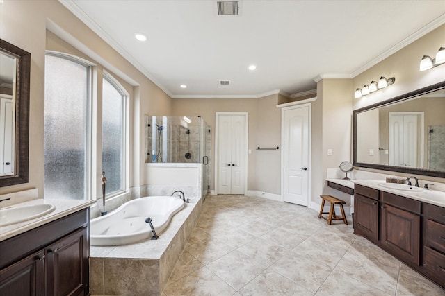 bathroom featuring vanity, independent shower and bath, a healthy amount of sunlight, and crown molding