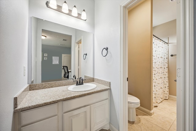 bathroom featuring tile patterned flooring, vanity, toilet, and a shower with curtain