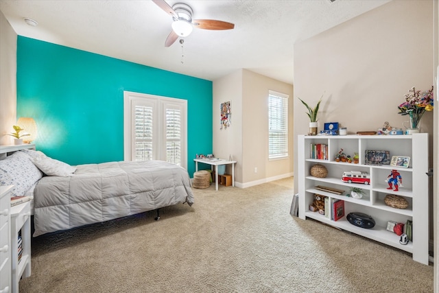 bedroom featuring carpet and ceiling fan