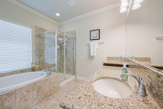 bathroom with ornamental molding, separate shower and tub, and vanity