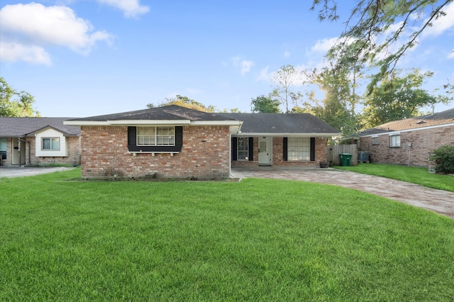 single story home featuring a front yard