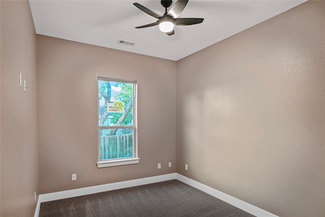 empty room with carpet floors and ceiling fan