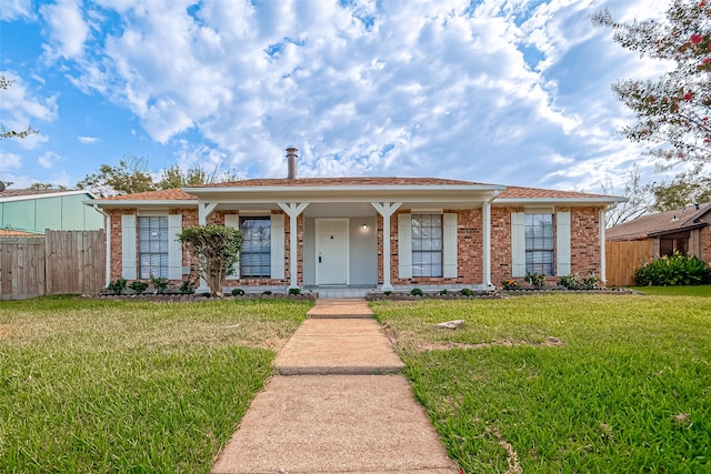 single story home with a front yard and a porch