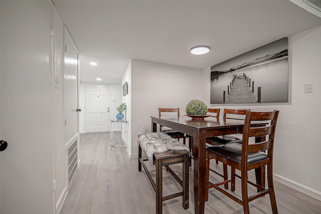 dining room featuring hardwood / wood-style flooring