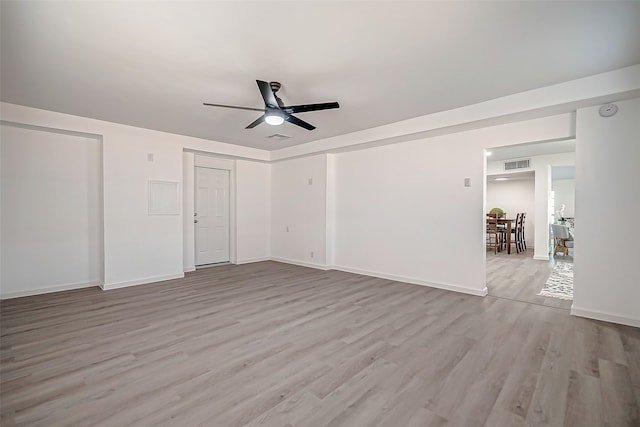 unfurnished bedroom with ceiling fan and light hardwood / wood-style flooring