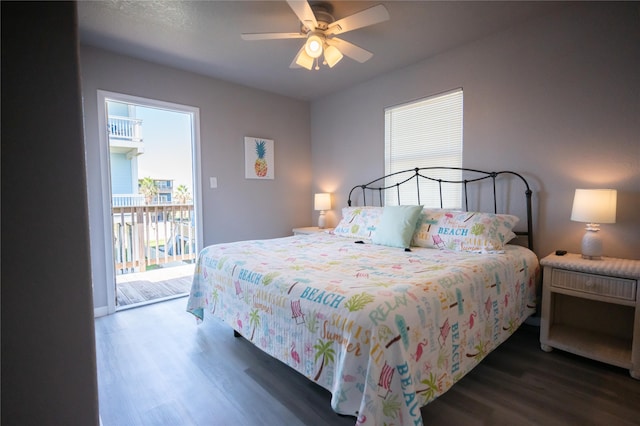 bedroom featuring ceiling fan, access to exterior, and dark hardwood / wood-style flooring