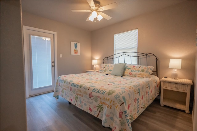 bedroom with dark wood-type flooring and ceiling fan