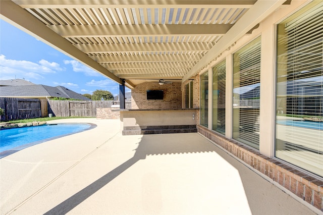 view of swimming pool featuring a patio area