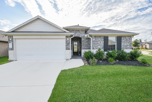 view of front facade with a front lawn and a garage