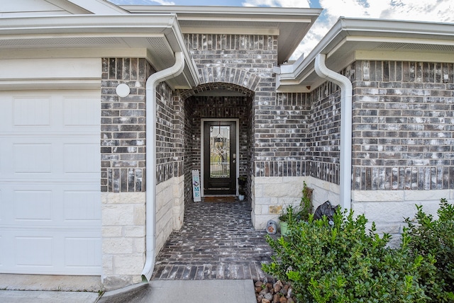 entrance to property featuring a garage