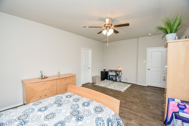 bedroom featuring ceiling fan and dark hardwood / wood-style flooring