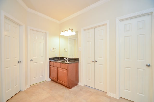 bathroom featuring vanity and crown molding