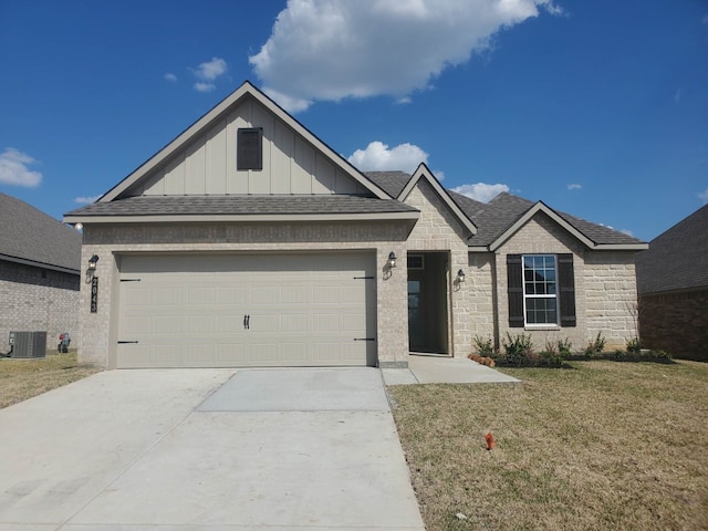 ranch-style house with an attached garage, central AC unit, board and batten siding, driveway, and a front lawn