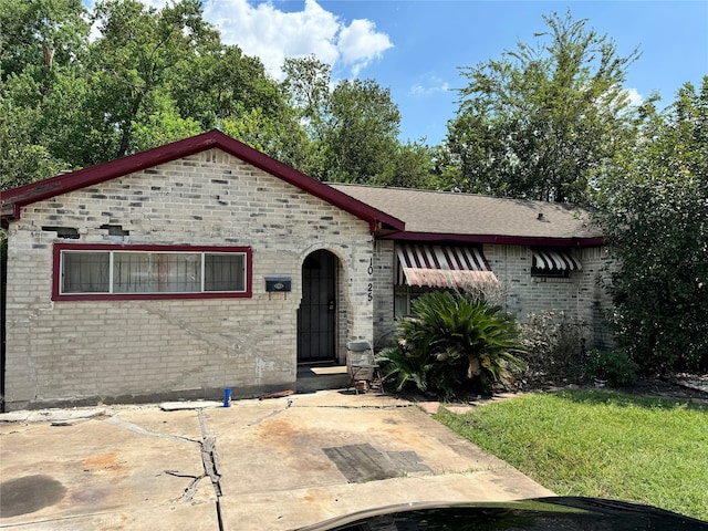 view of front of home with a patio area