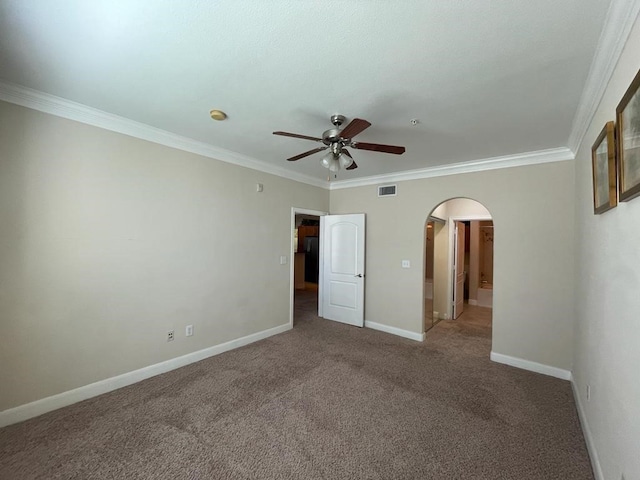 unfurnished bedroom with carpet floors, ornamental molding, and ceiling fan