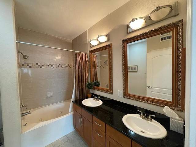 bathroom featuring shower / bath combo, vanity, and tile patterned floors