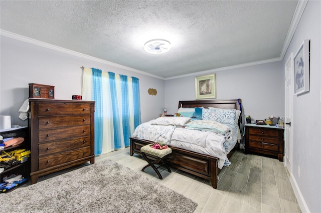 bedroom with ornamental molding, a textured ceiling, and light hardwood / wood-style flooring