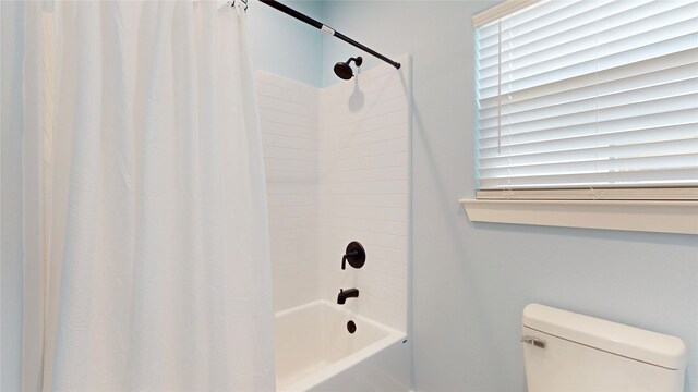 846 Alma, Crystal Beach, TX 77650 - bathroom with toilet and shower / tub combo