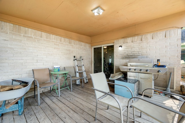 wooden deck featuring grilling area